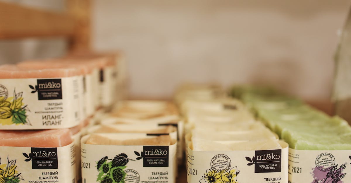 A selection of natural skincare products, including soaps, is neatly organized indoors for sale